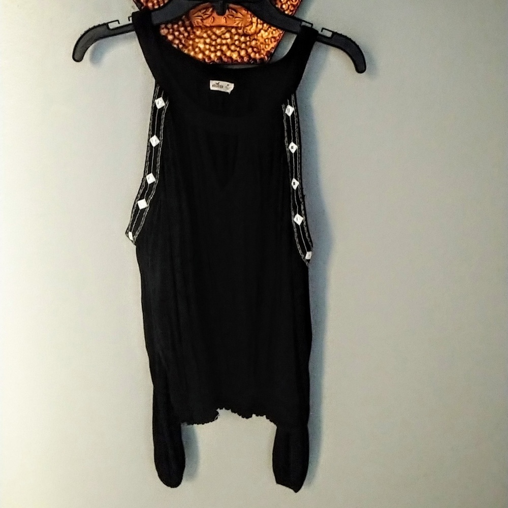 Black cut out shoulder blouse with diamond accents